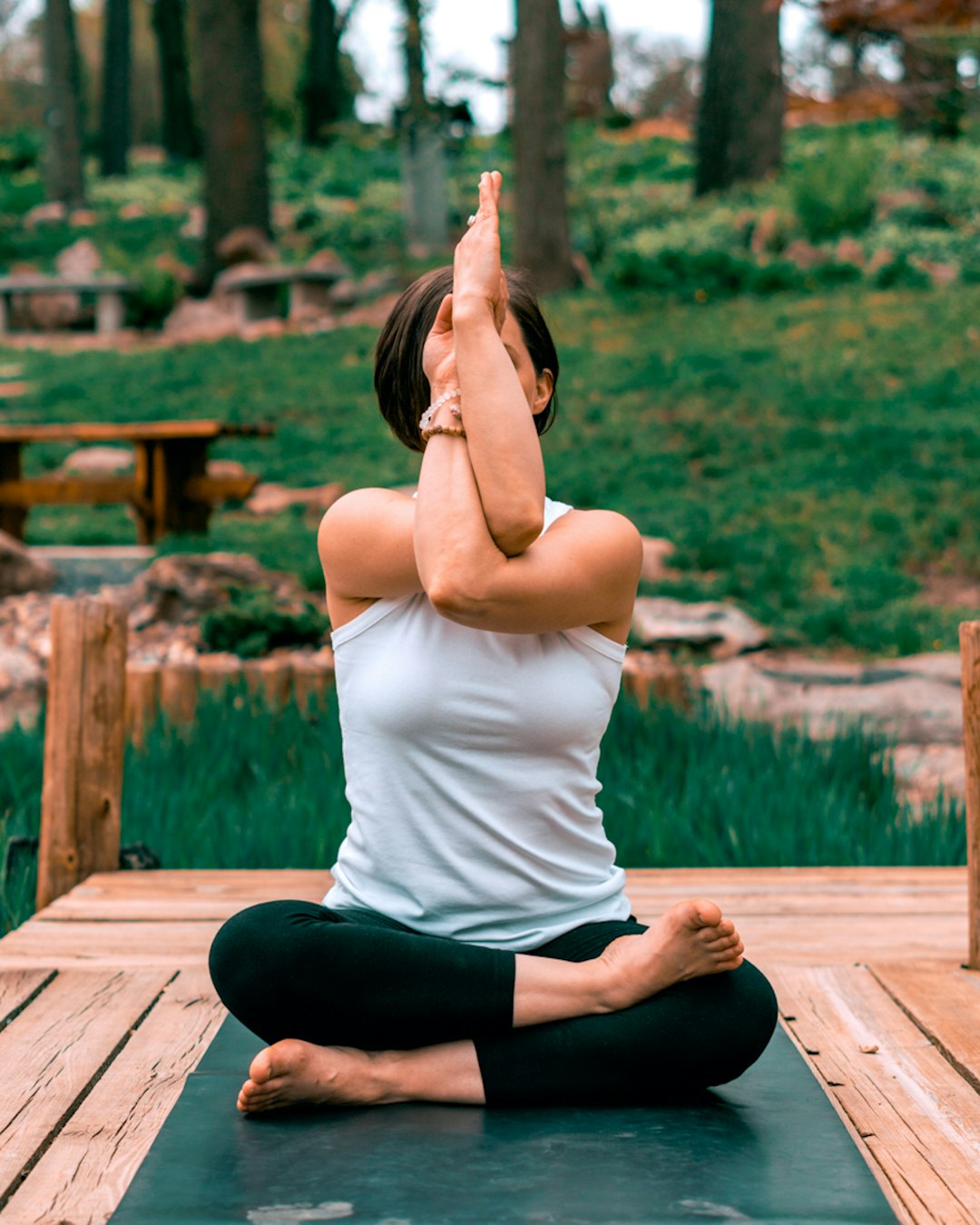 woman-performing-yoga-wmznegkcsmw